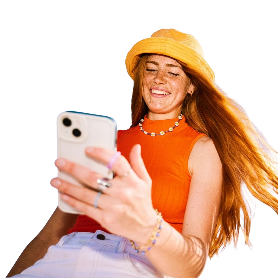 Person smiling at phone